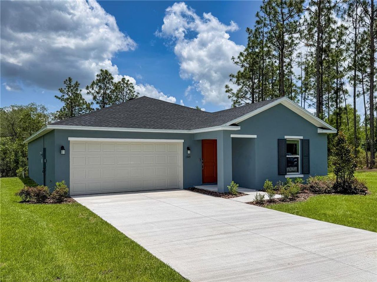 Front exterior of a new home in Marion Oaks, Ocala, FL, highlighting curb appeal (Image 2). Front exterior of a new home in Marion Oaks, Ocala, FL, highlighting curb appeal (Image 2).