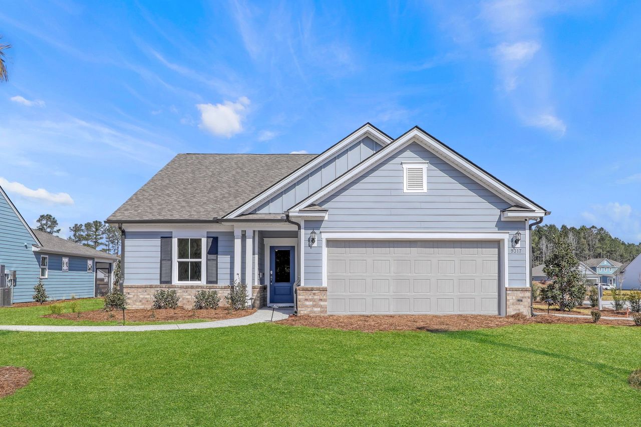Front exterior of a new home in Southport Meadows, Southport, NC, highlighting curb appeal (Image 2).