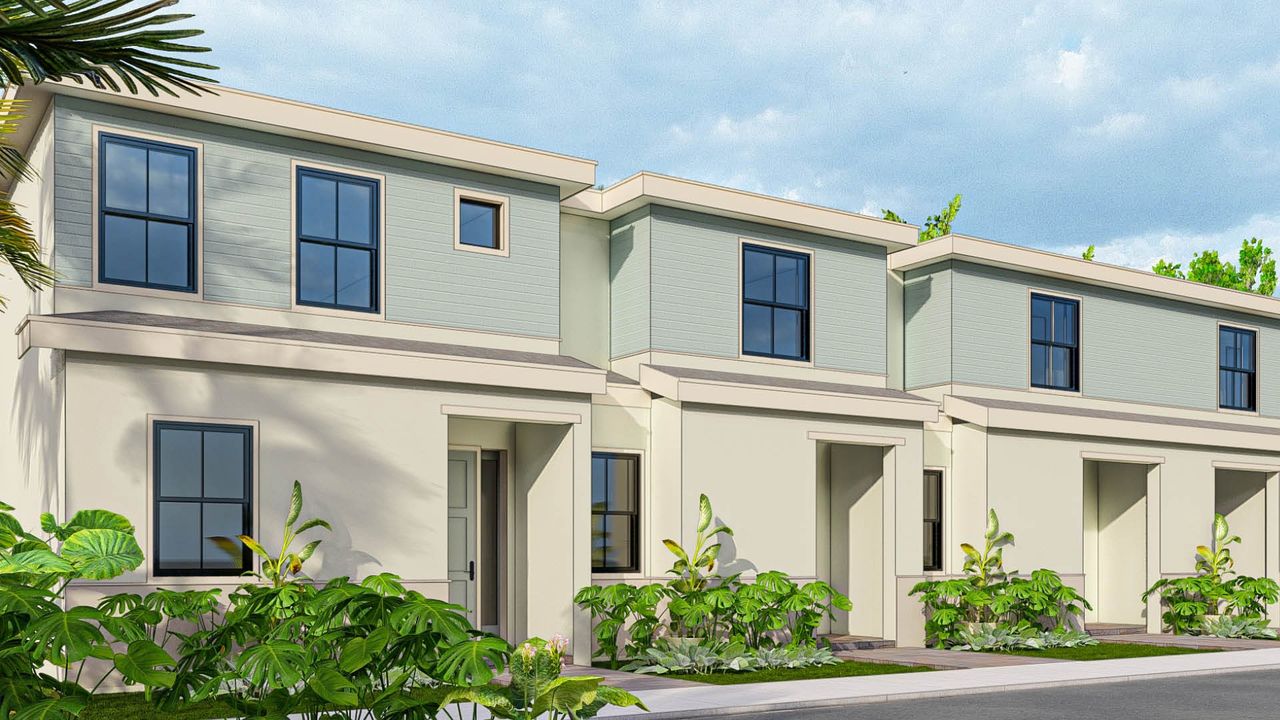 Front exterior of a new home in Palm Cay, Florida City, FL, highlighting curb appeal (Image 2). Front exterior of a new home in Palm Cay, Florida City, FL, highlighting curb appeal (Image 2).