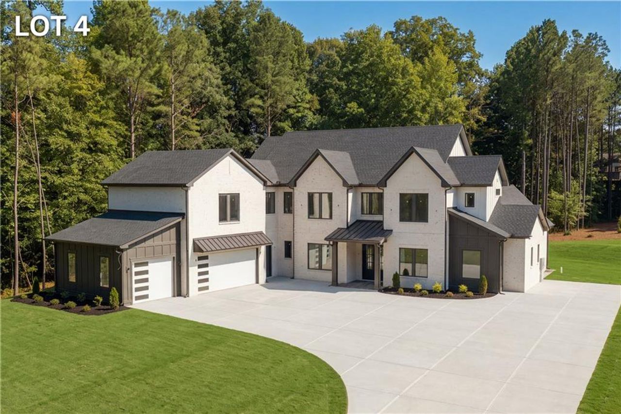 Front exterior of a new home in , Braselton, GA, highlighting curb appeal (Image 2). Front exterior of a new home in , Braselton, GA, highlighting curb appeal (Image 2).