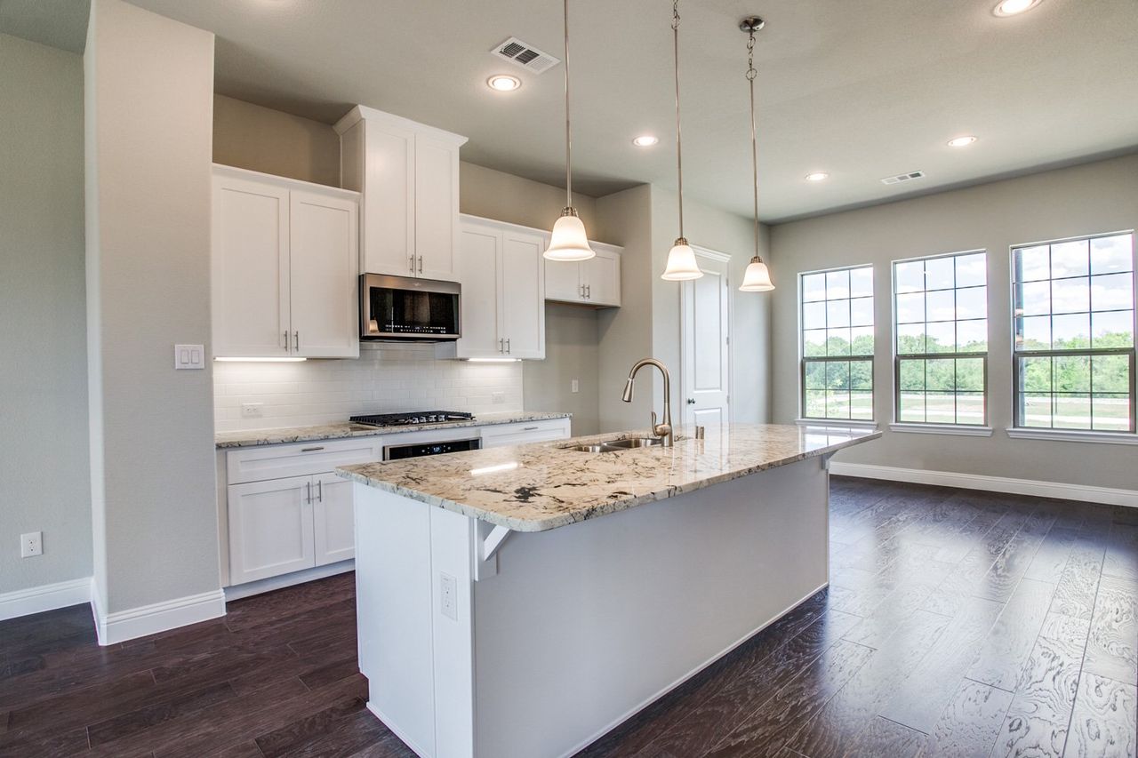 Representative furnished interior of a home built from the Lakeridge - END by Megatel Homes in Pinnacle at Riverwalk, Flower Mound (Image 2). Representative furnished interior of a home built from the Lakeridge - END by Megatel Homes in Pinnacle at Riverwalk, Flower Mound (Image 2).