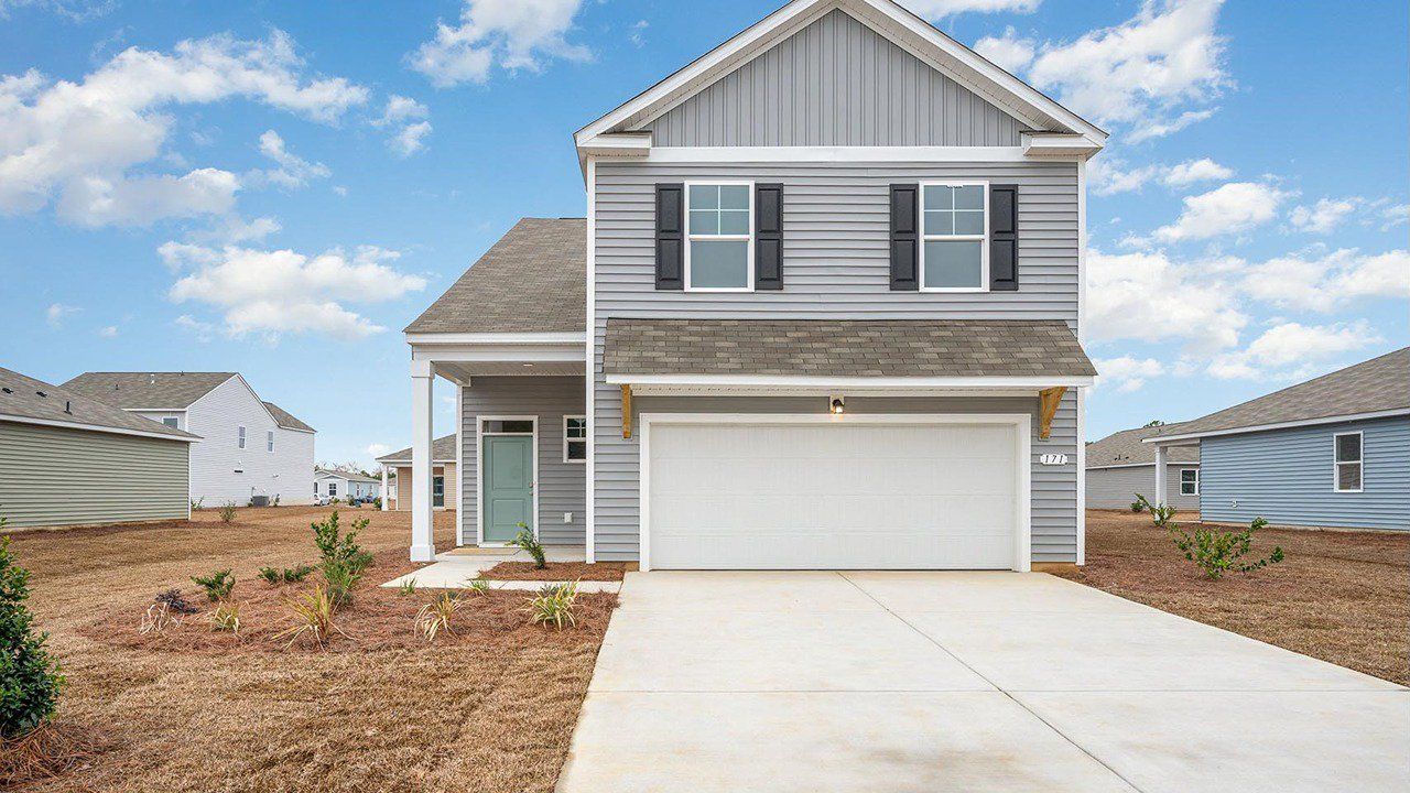 Representative exterior photo of a completed home built from the Wren by D.R. Horton in The Reserve at Wild Horse, Conway, SC (Image 2).