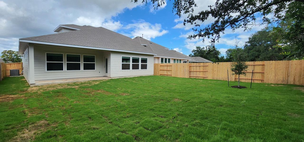 A spacious, newly landscaped backyard, perfect for outdoor activities and private enjoyment. A spacious, newly landscaped backyard, perfect for outdoor activities and private enjoyment.