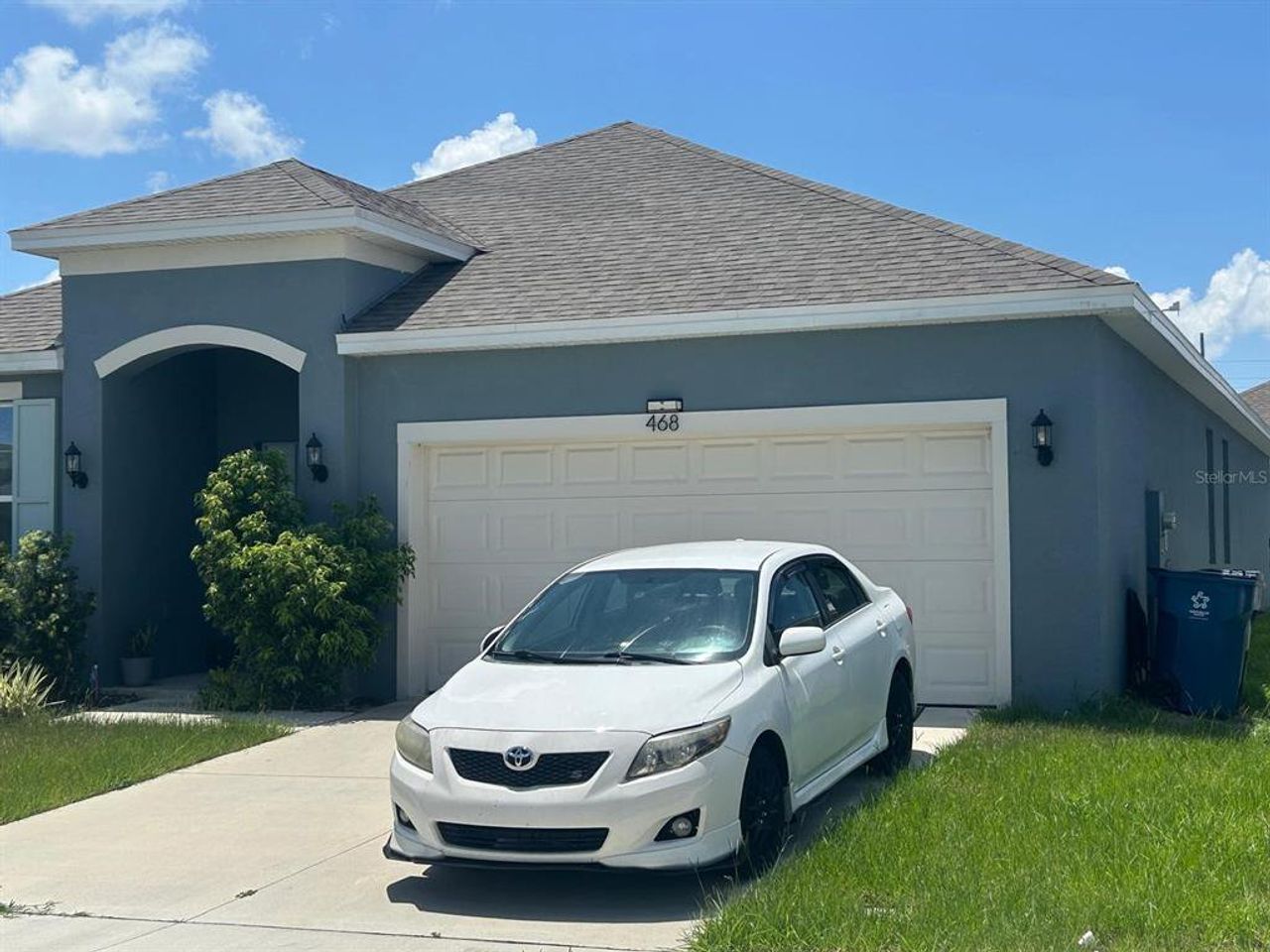 Front exterior of a new home in Cypress Park Estates, Haines City, FL, highlighting curb appeal (Image 2).