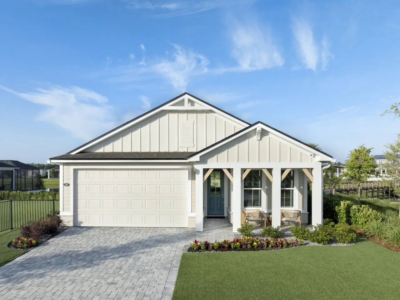 Front exterior of a new home in RiverTown, St. Johns, FL, highlighting curb appeal (Image 2). Front exterior of a new home in RiverTown, St. Johns, FL, highlighting curb appeal (Image 2).