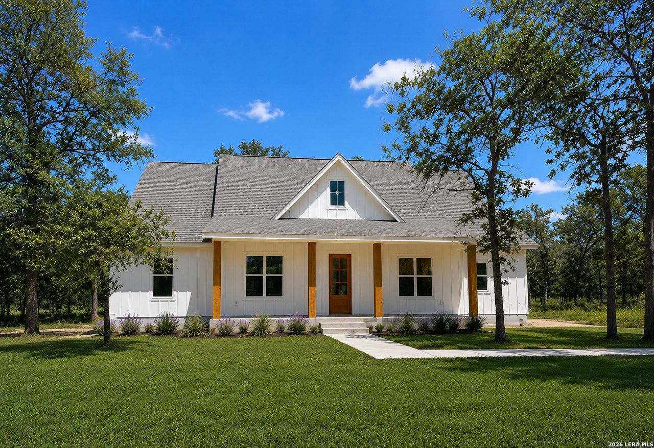 Front exterior of a new home in , La Vernia, TX, highlighting curb appeal (Image 2).