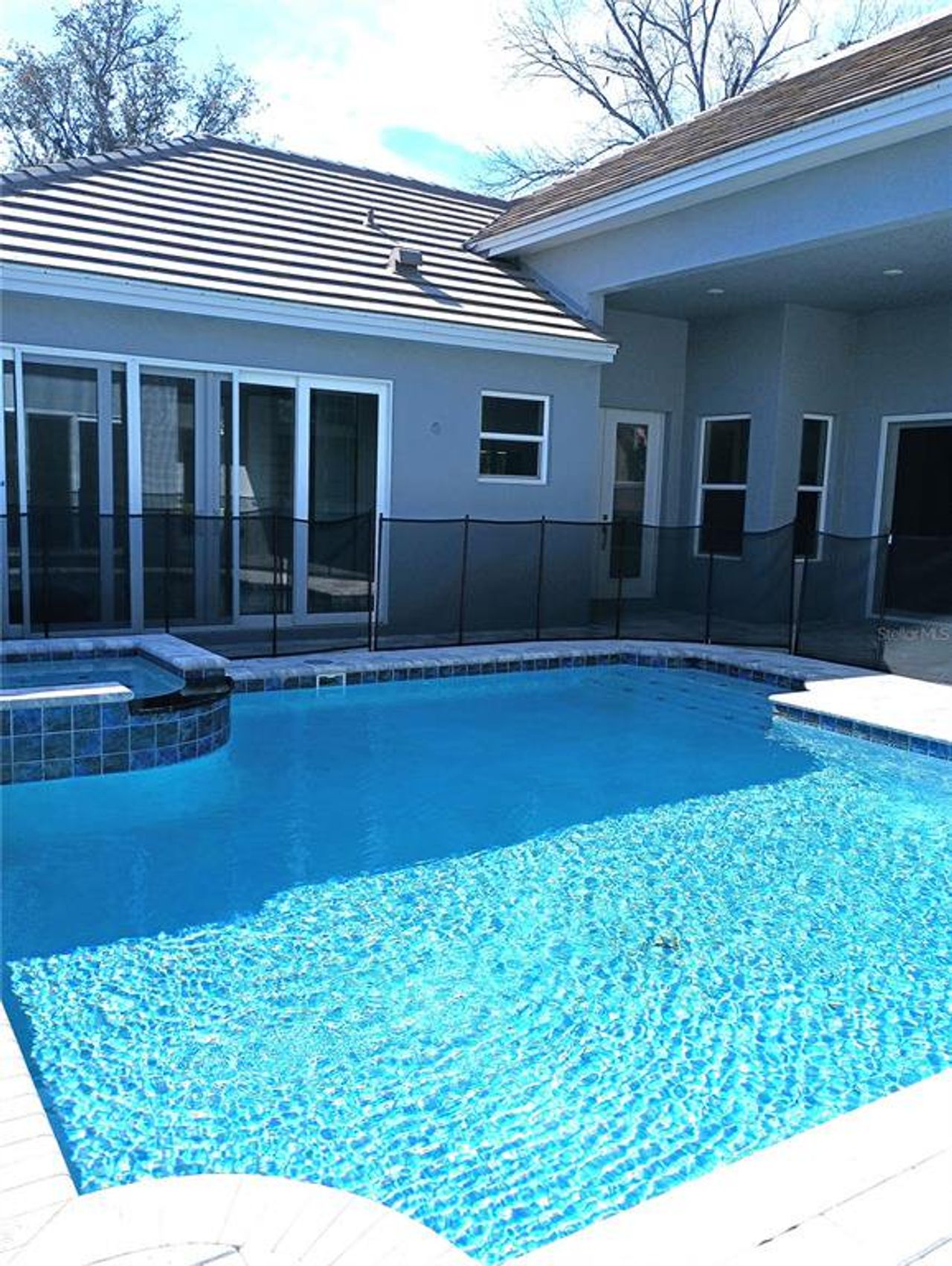 Exterior details and patio area of a home in Toscana, Palm Coast (Image 2).