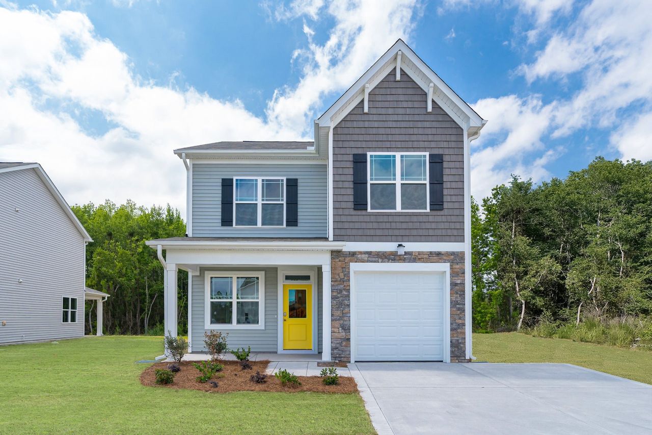 Representative exterior photo of a completed home built from the Winslow by McKee Homes in Sandy Springs, Aberdeen, NC (Image 2).