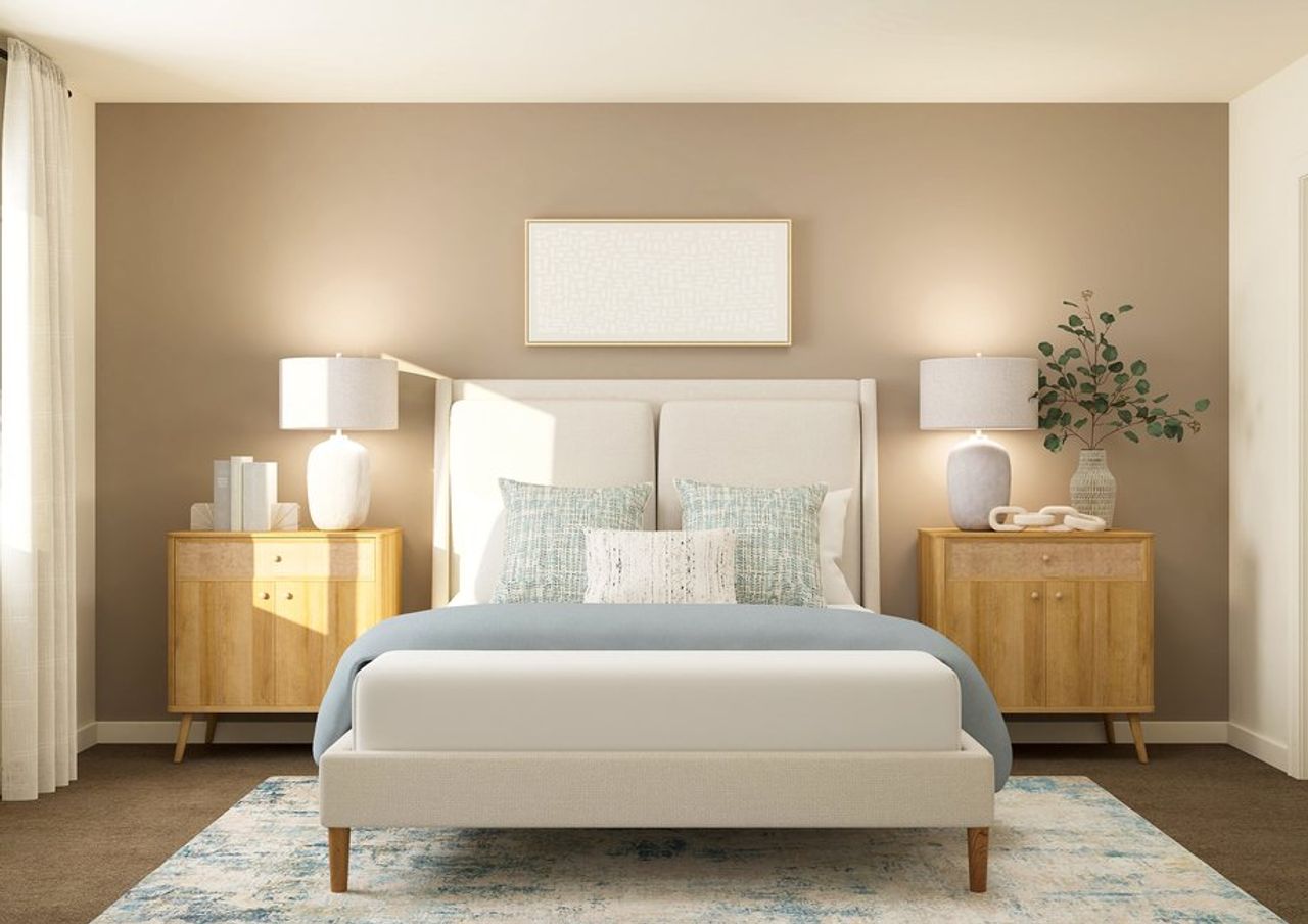 Rendering of a bedroom furnished with a large white couch in between two side tables. Rendering of a bedroom furnished with a large white couch in between two side tables.