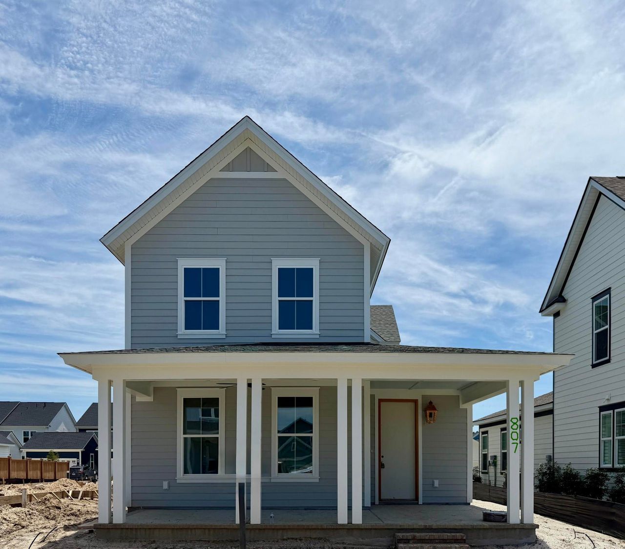 Exterior details and patio area of a home in The Piedmont Collection at Midtown Nexton, Summerville (Image 2).