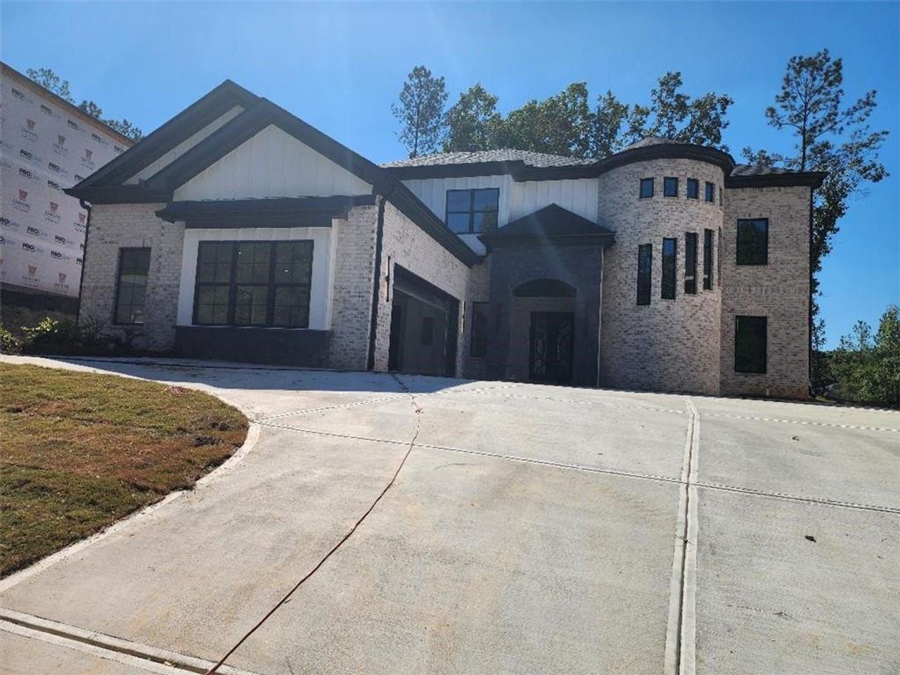 Front exterior of a new home in , Fairburn, GA, highlighting curb appeal (Image 2).