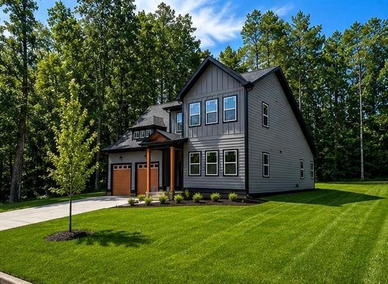 Front exterior of a new home in , Douglasville, GA, highlighting curb appeal (Image 2).