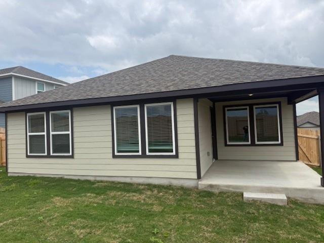 Exterior details and patio area of a home in Creekfall, Burnet (Image 2).
