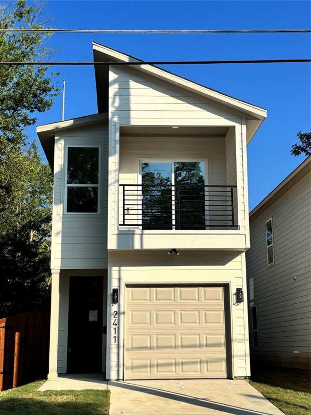 Front exterior of a new home in , Dallas, TX, highlighting curb appeal (Image 2).