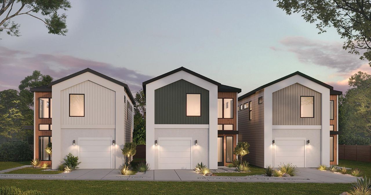 Contemporary multi-story residences featuring pitched roofs and integrated garages