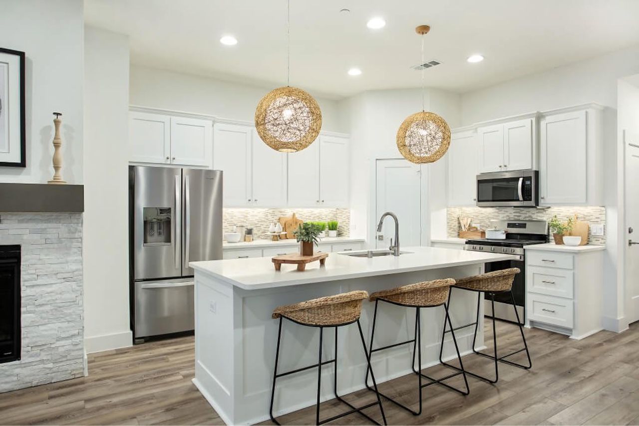 Representative furnished interior of a home built from the Birch by Grenadier Homes in Willow Grove Townhomes, Melissa (Image 2).