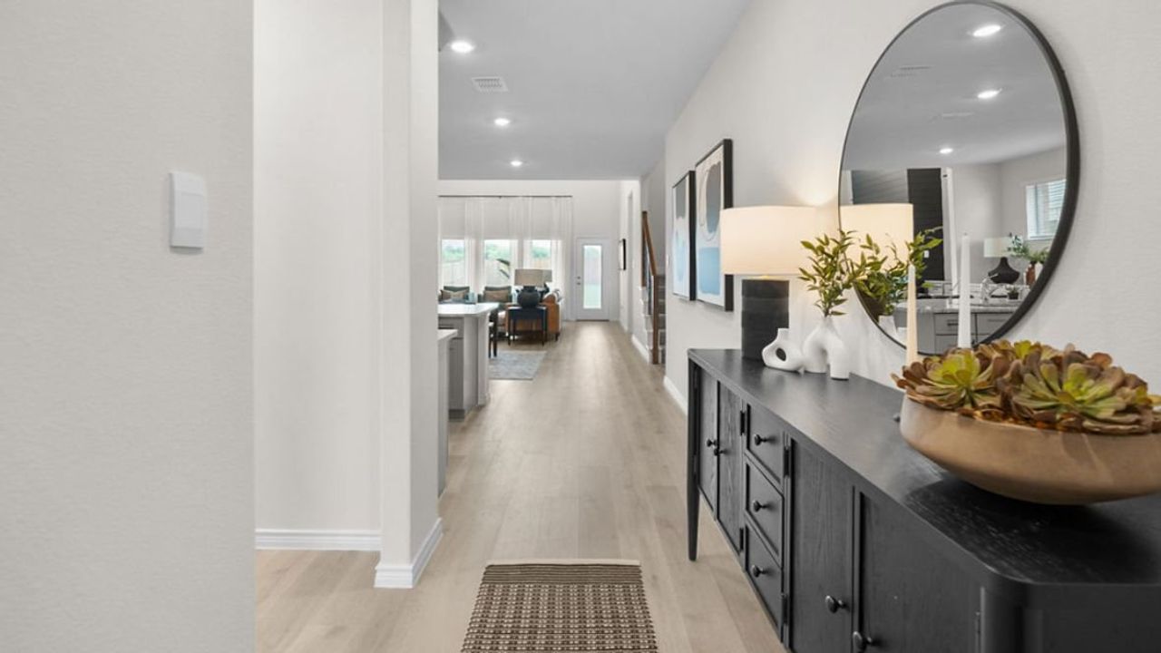 Furnished interior view inside a new home in The Preserve at Forum, Grand Prairie (Image 2). Furnished interior view inside a new home in The Preserve at Forum, Grand Prairie (Image 2).