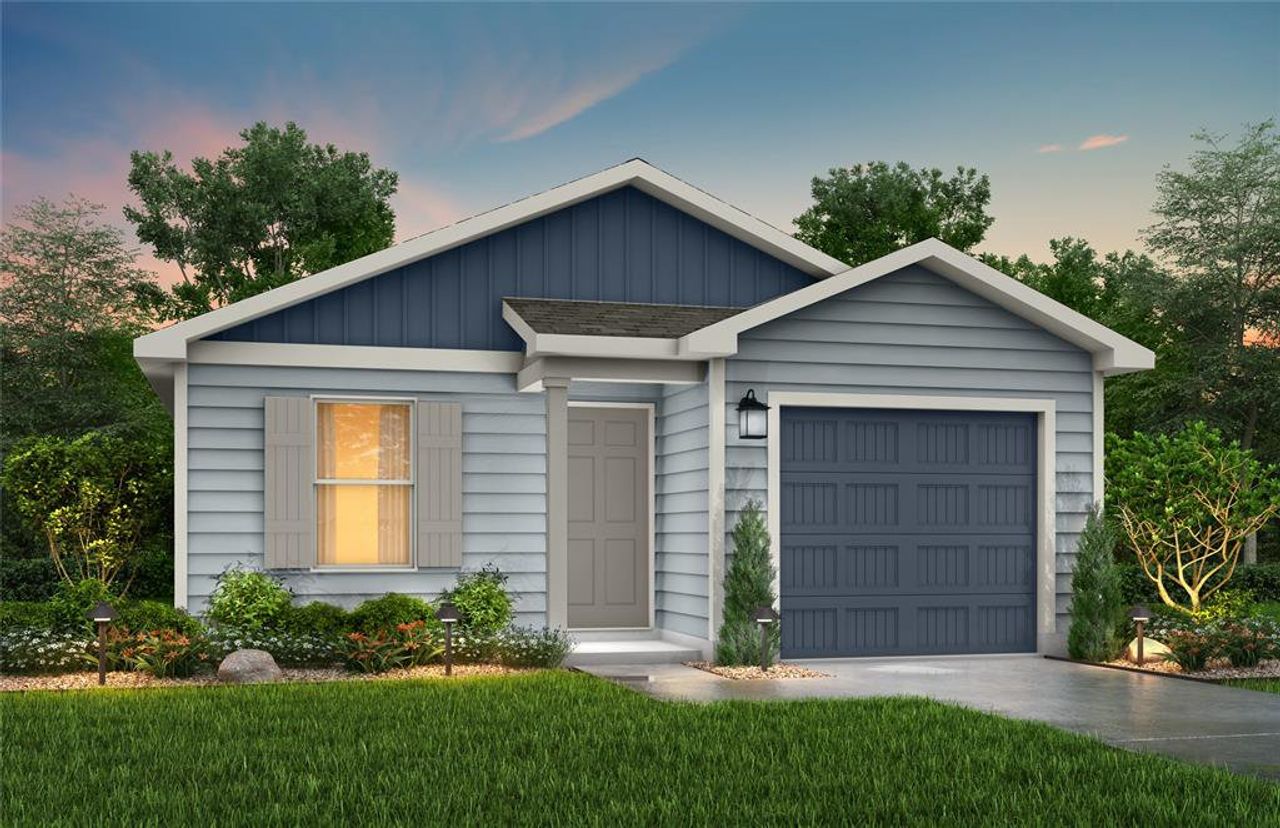 View of front of home featuring a garage and a yard View of front of home featuring a garage and a yard
