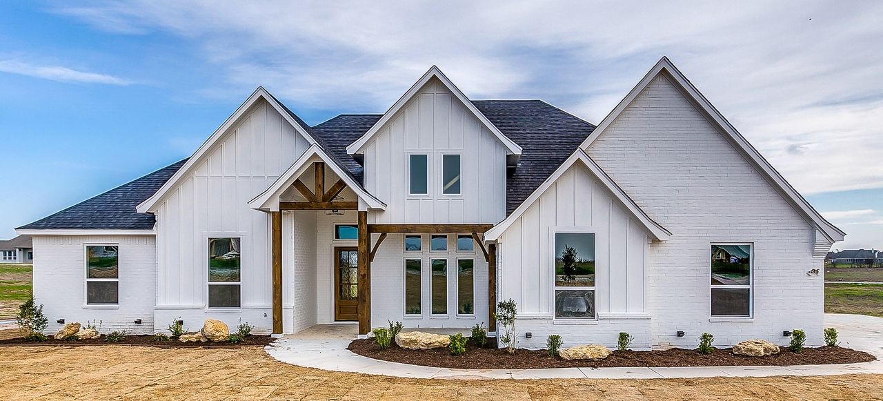 Representative exterior photo of a completed home built from the 105-2496-0619 by Abba River Homes in Stanford Estates, Springtown, TX (Image 2). Representative exterior photo of a completed home built from the 105-2496-0619 by Abba River Homes in Stanford Estates, Springtown, TX (Image 2).