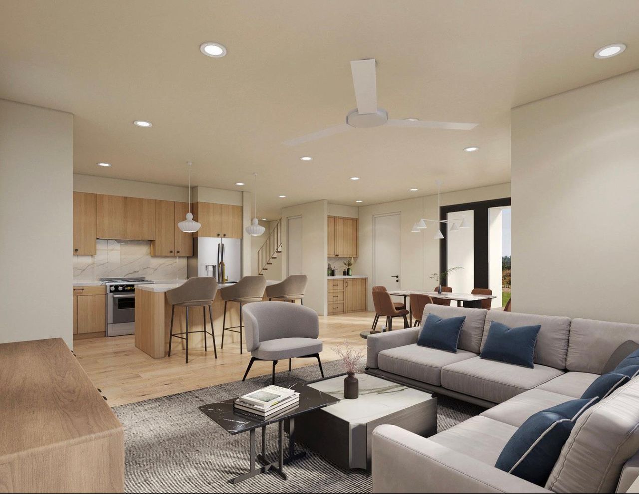 Living area featuring light wood-style floors, stairs, recessed lighting, and ceiling fan