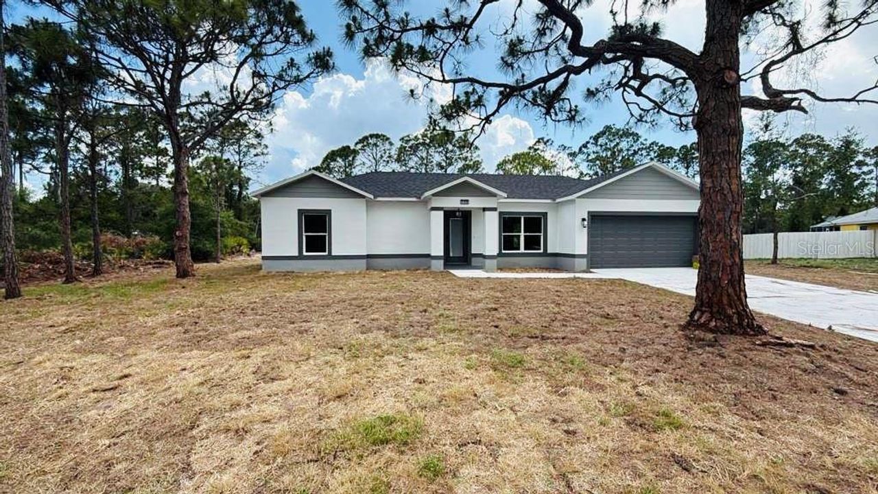 Exterior details and patio area of a home in , Sebring (Image 2).