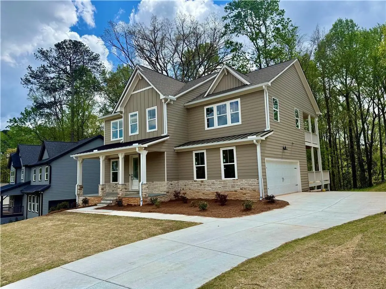 Front exterior of a new home in , Atlanta, GA, highlighting curb appeal (Image 2). Front exterior of a new home in , Atlanta, GA, highlighting curb appeal (Image 2).