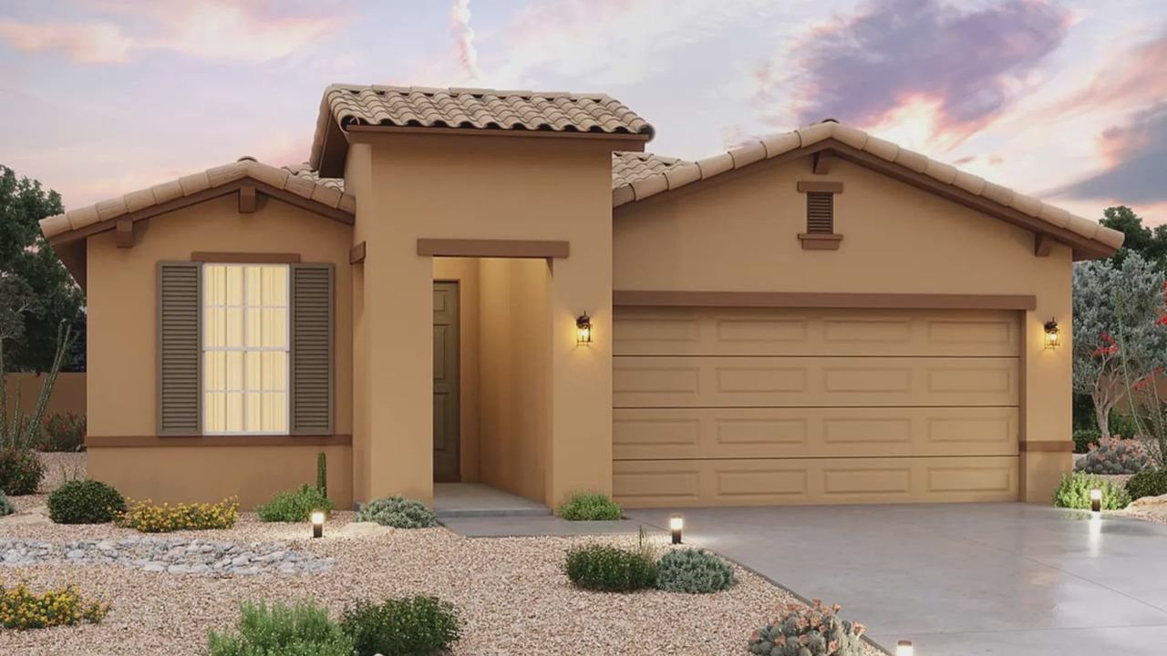 Front exterior of a new home in Sienna Park, Buckeye, AZ, highlighting curb appeal (Image 2).