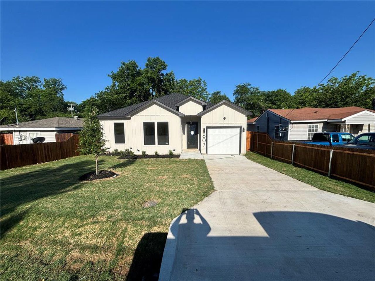 Front exterior of a new home in , Dallas, TX, highlighting curb appeal (Image 2).