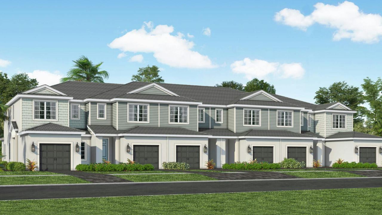 Front exterior of a new home in SkySail Real Estate and Homes for Sale in Naples, FL - Neal Communities, Naples, FL, highlighting curb appeal (Image 2). Front exterior of a new home in SkySail Real Estate and Homes for Sale in Naples, FL - Neal Communities, Naples, FL, highlighting curb appeal (Image 2).