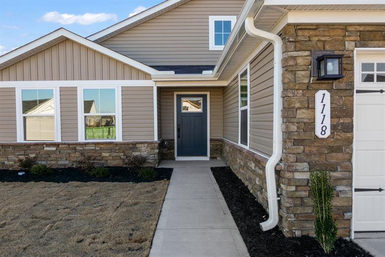 Exterior details and patio area of a home in Reidville Town Center Cottages, Duncan (Image 2).