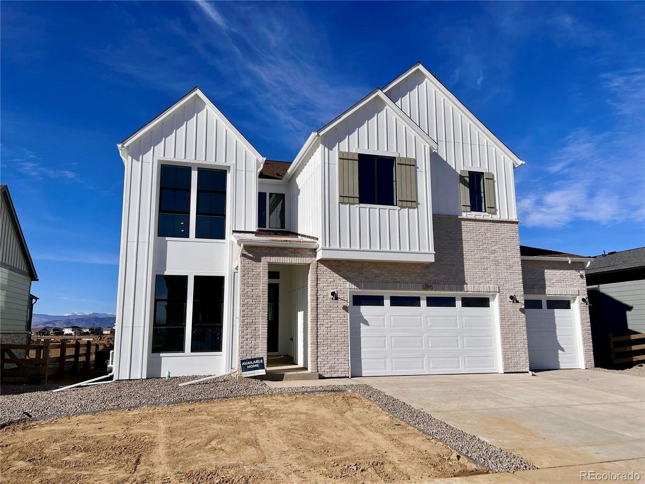 Front exterior of a new home in , Fort Collins, CO, highlighting curb appeal (Image 2).