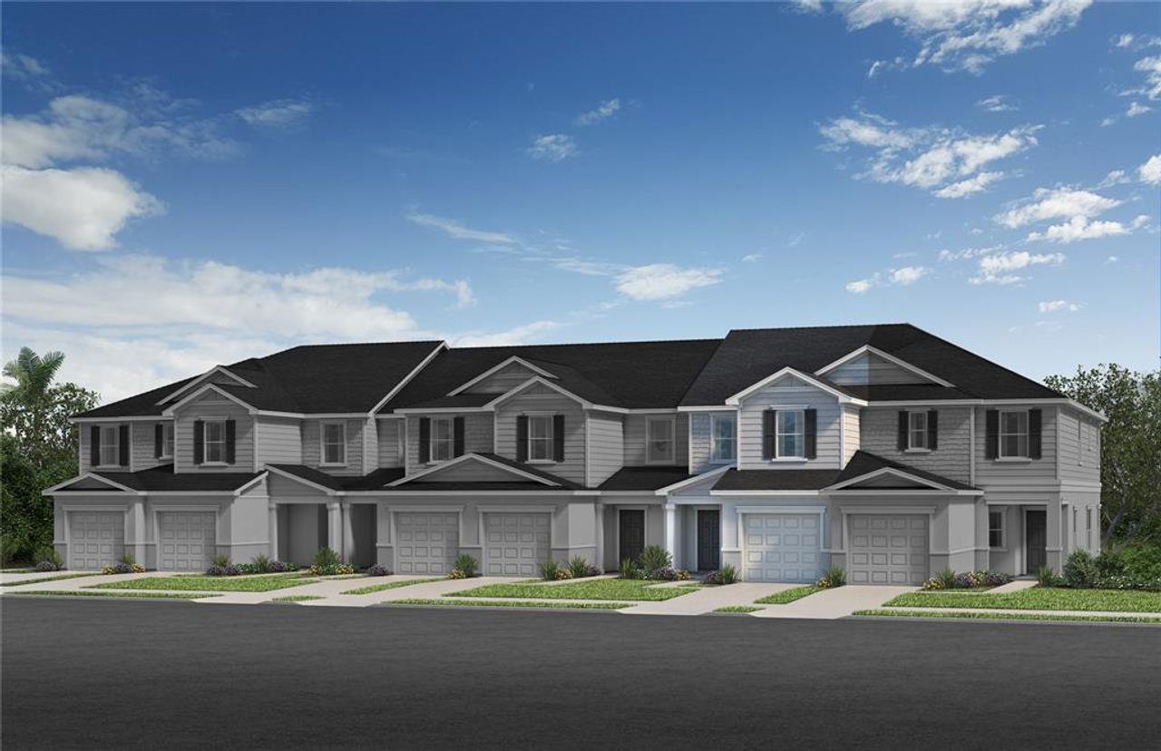 Front exterior of a new home in Reserve at Forest Lake Townhomes, Lake Wales, FL, highlighting curb appeal (Image 2).