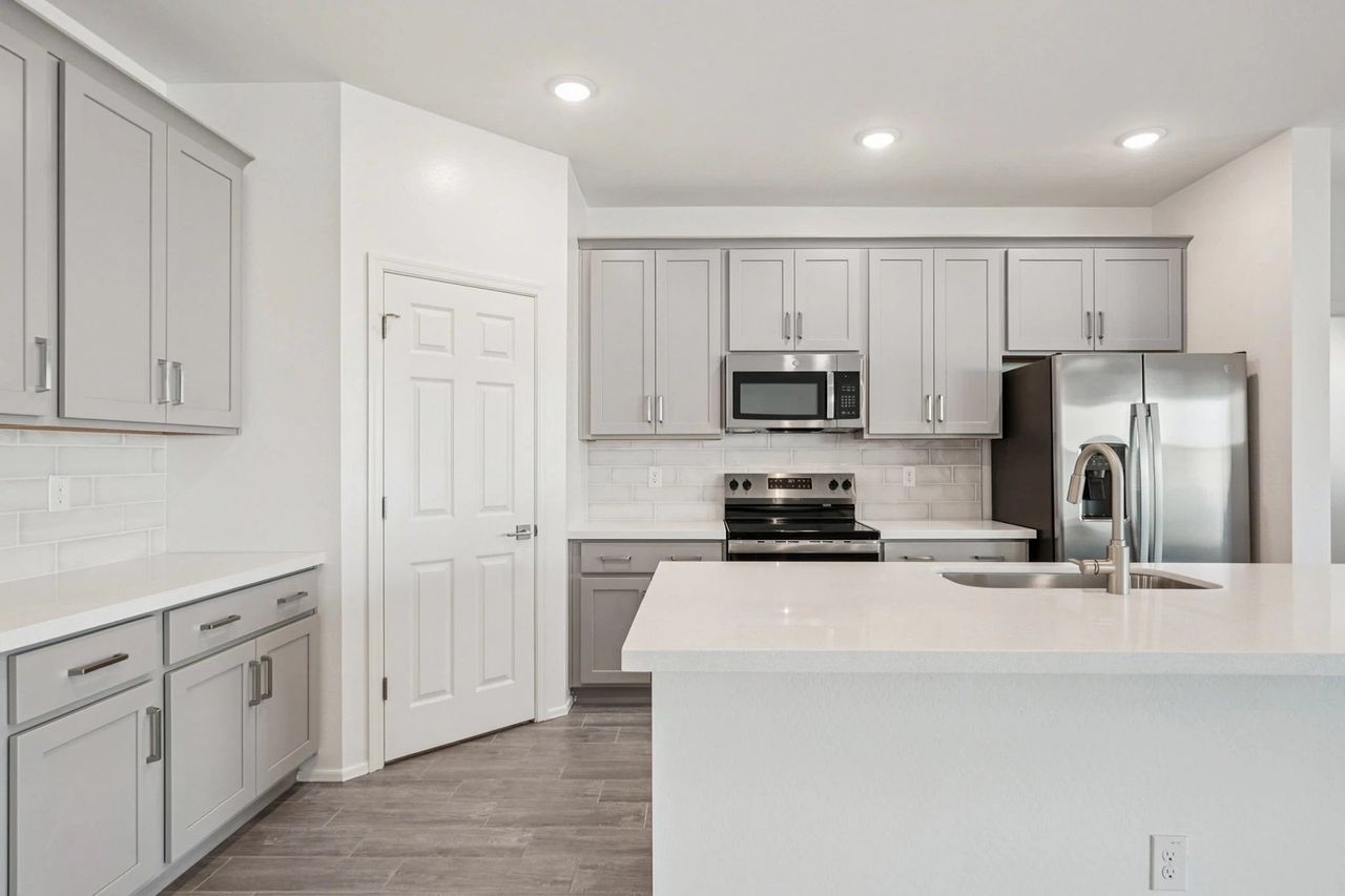 Kitchen & Great Room - finishes vary by community, see Sales Counselor for details