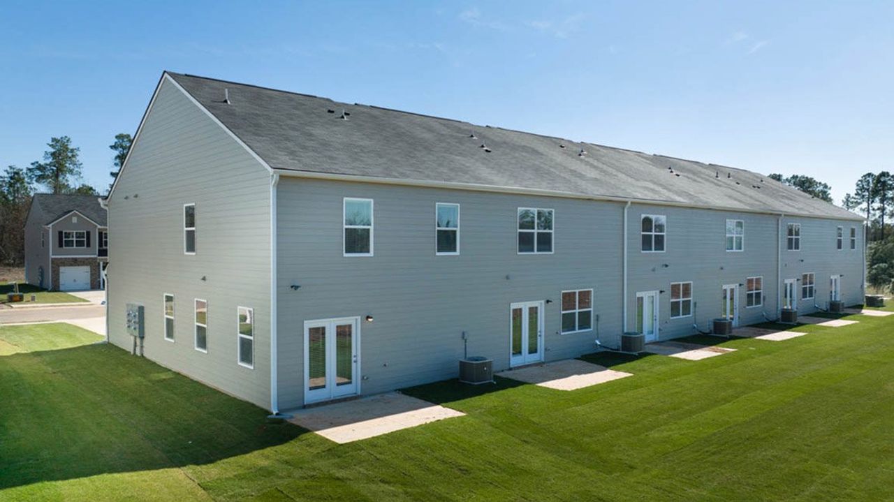 Exterior details and patio area of a home in Laurel Park Townhomes, Hephzibah (Image 2). Exterior details and patio area of a home in Laurel Park Townhomes, Hephzibah (Image 2).
