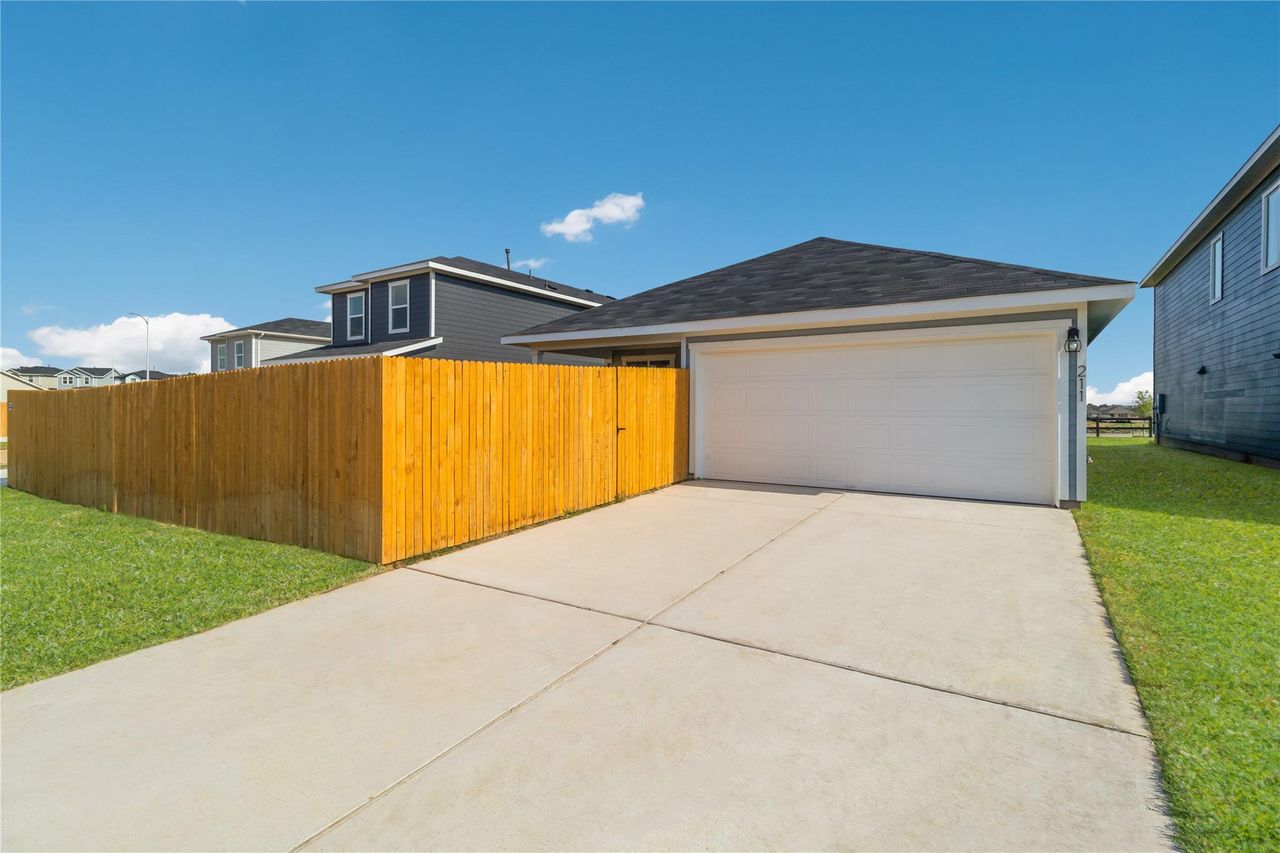 Front exterior of a new home in Valverde, Bastrop, TX, highlighting curb appeal (Image 2). Front exterior of a new home in Valverde, Bastrop, TX, highlighting curb appeal (Image 2).