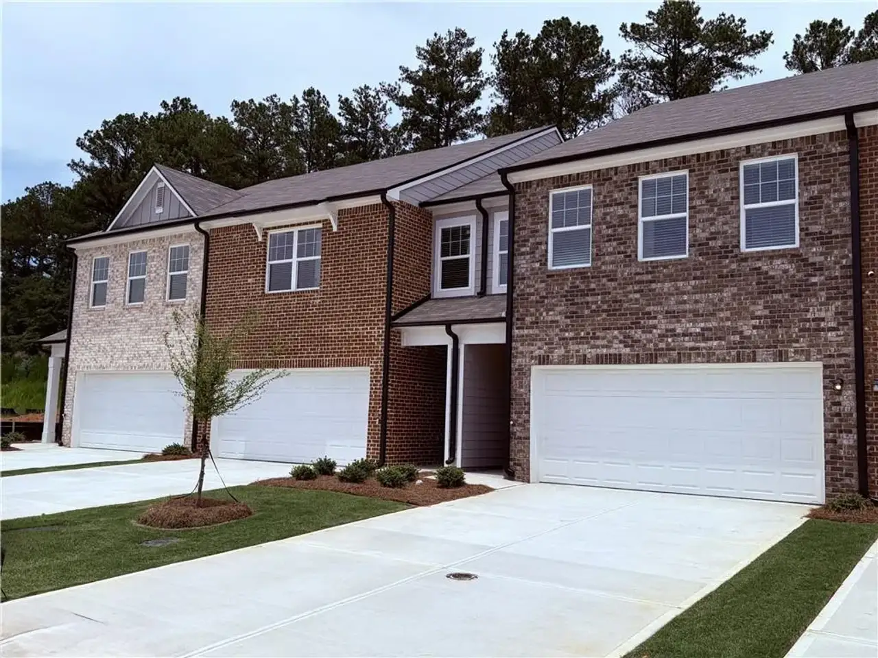 Front exterior of a new home in Kendall Grove, McDonough, GA, highlighting curb appeal (Image 2).