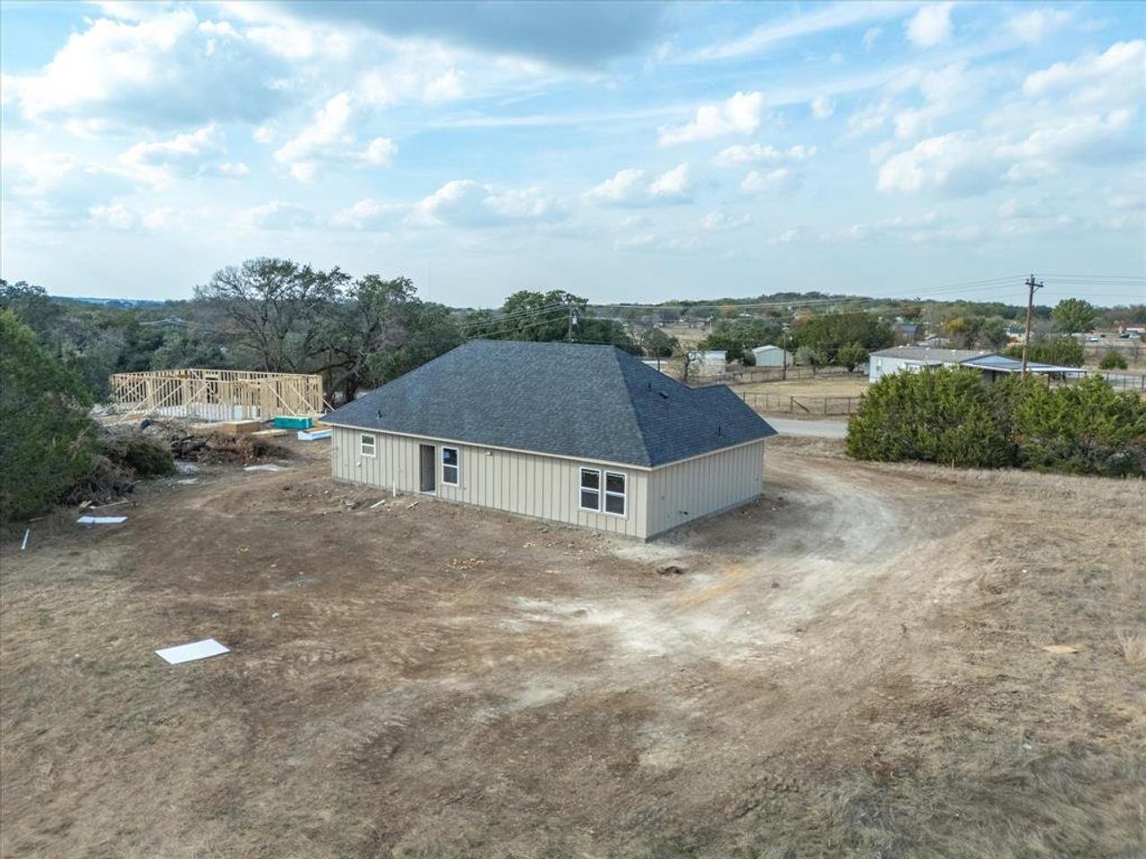 In-progress construction of a new home in , Granbury, TX (Image 2).
