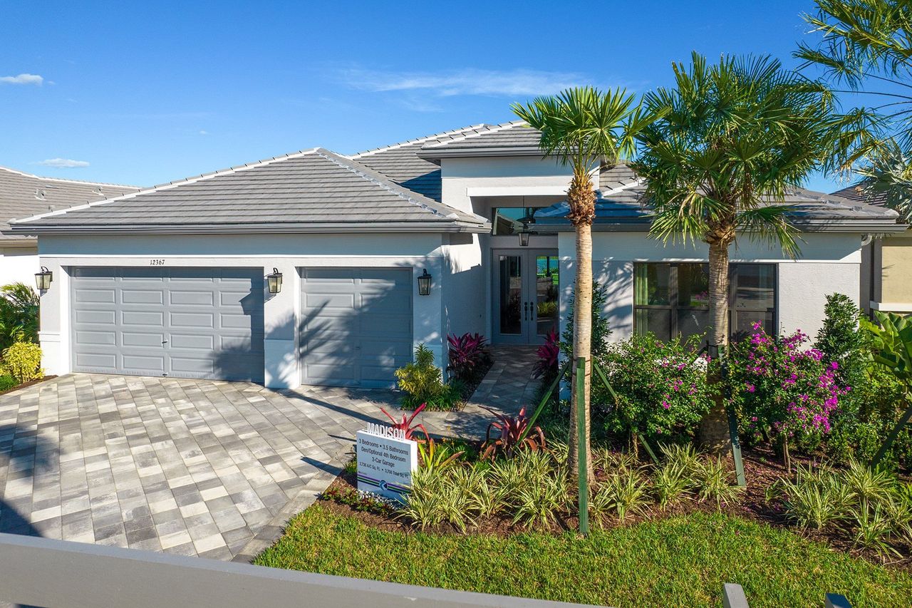 Front exterior of a new home in Valencia Parc at Riverland, Port St. Lucie, FL, highlighting curb appeal (Image 2).