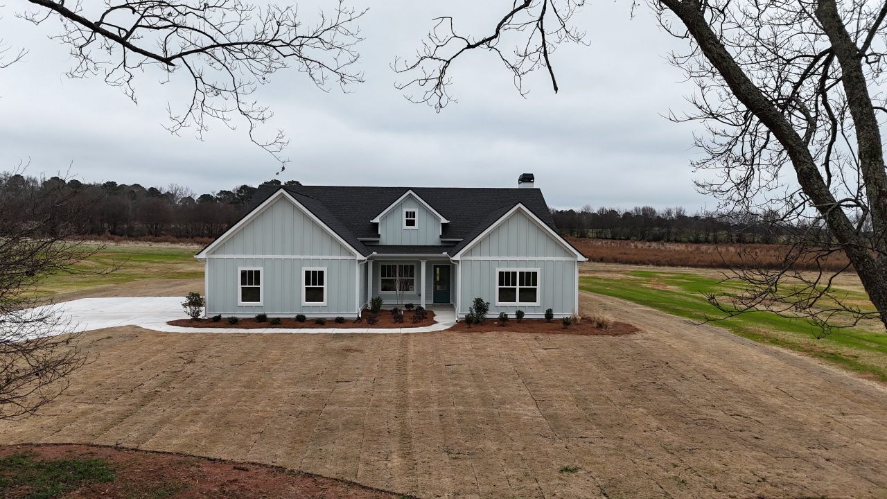 Front exterior of a home in the Rover Roc Farms community, located in Williamson, GA (Image 2).