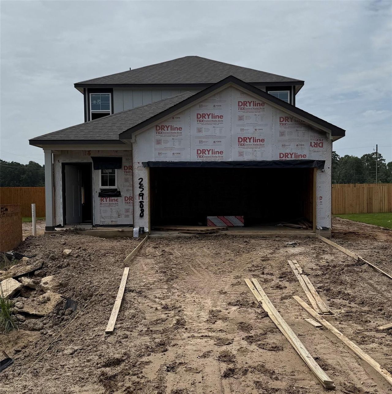 Front exterior of a new home in Liberty Estates, Cleveland, TX, highlighting curb appeal (Image 2).