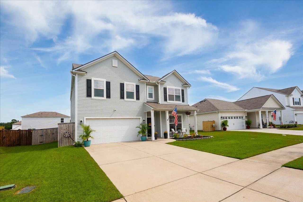 Front exterior of a new home in Nexton, Summerville, SC, highlighting curb appeal (Image 2).