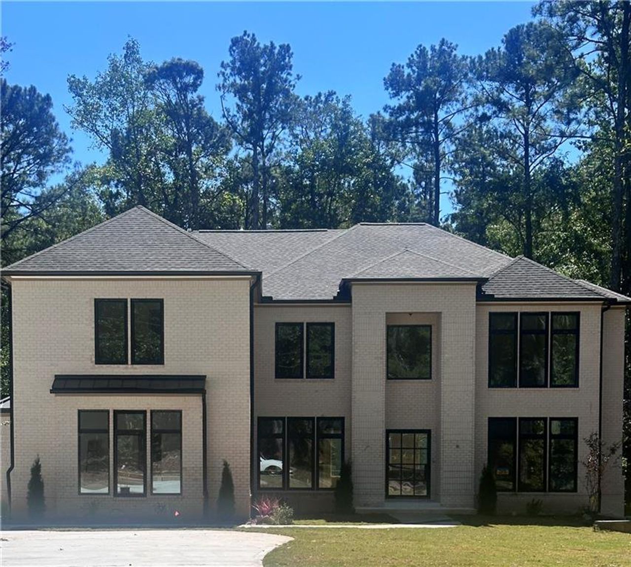 Front exterior of a new home in , Atlanta, GA, highlighting curb appeal (Image 2).