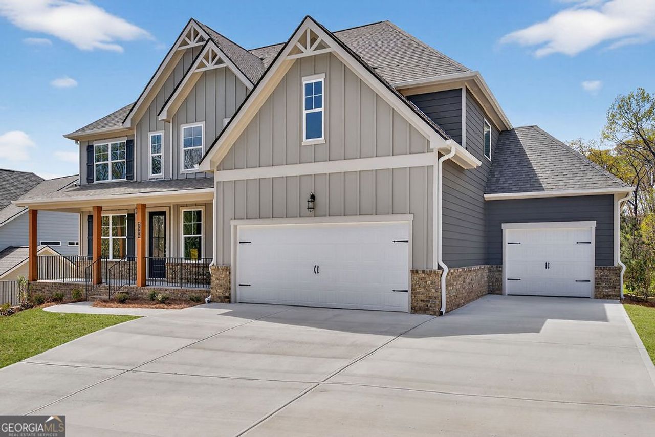 Front exterior of a new home in The Manor at Gainesville Township, Gainesville, GA, highlighting curb appeal (Image 2).