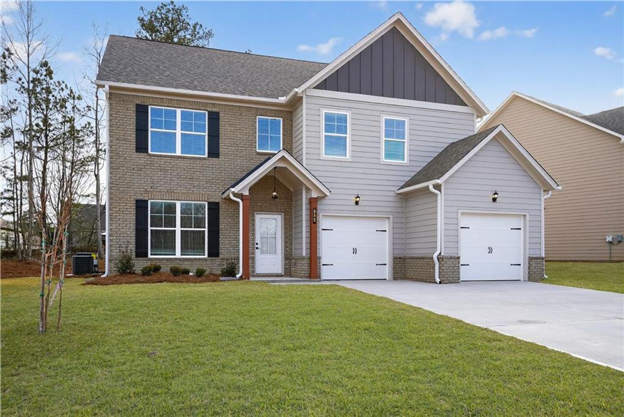 Front exterior of a new home in , Villa Rica, GA, highlighting curb appeal (Image 2).