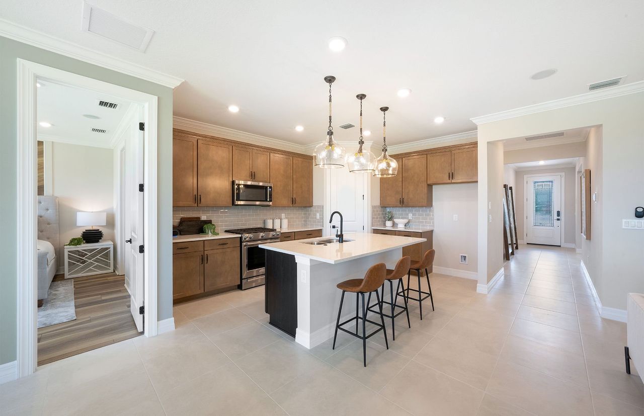 Furnished interior view inside a new home in Waterstone at Halifax Plantation, Ormond Beach (Image 2).