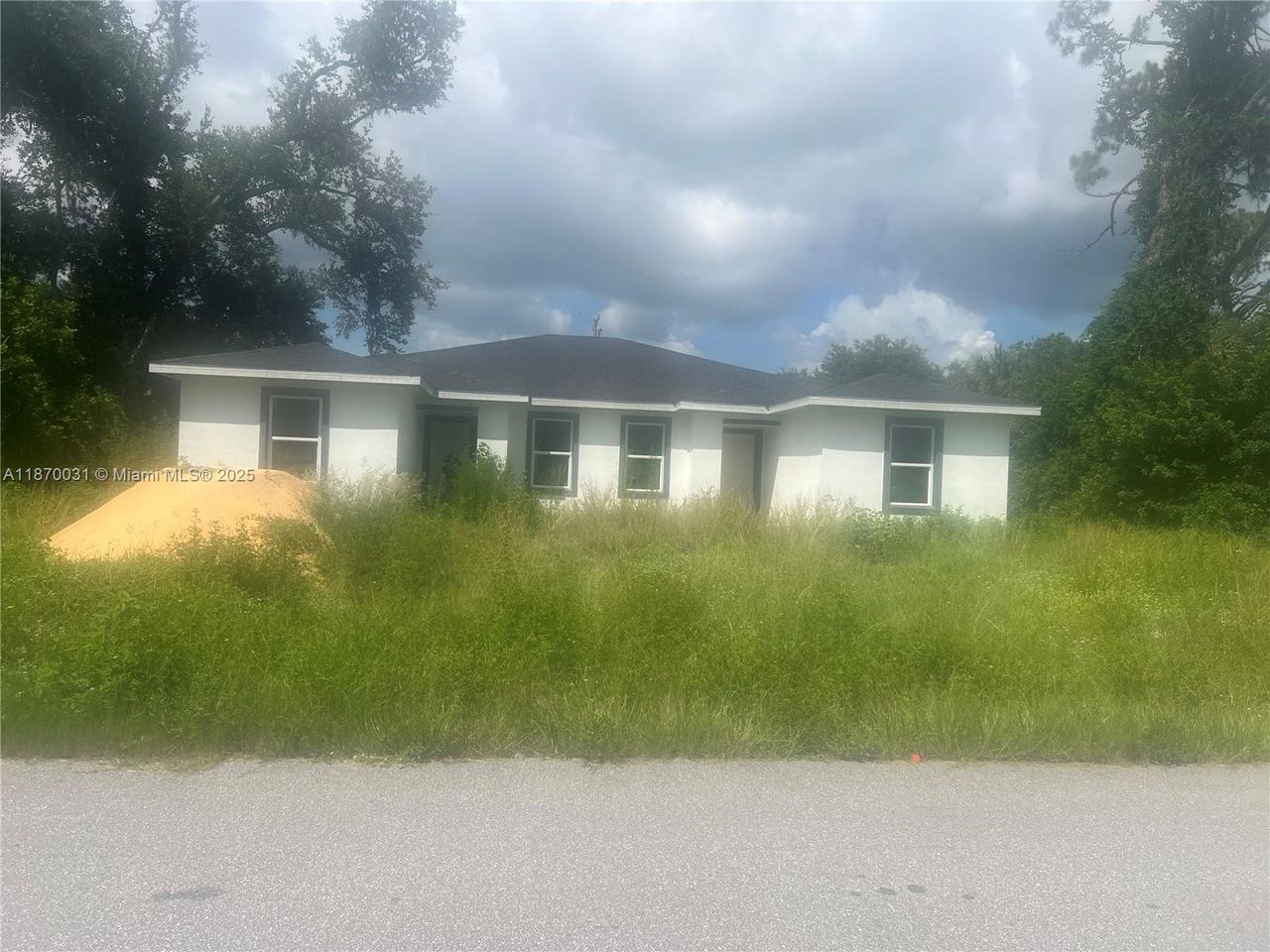 Front exterior of a new home in , Port Charlotte, FL, highlighting curb appeal (Image 2). Front exterior of a new home in , Port Charlotte, FL, highlighting curb appeal (Image 2).