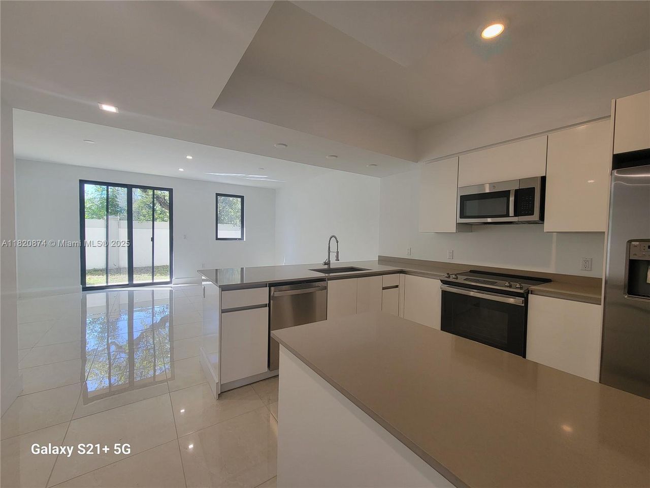 Furnished interior view inside a new home in , Dania Beach (Image 2).