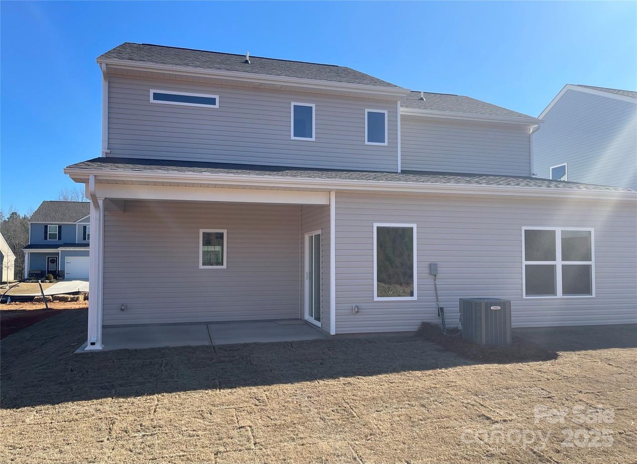 Exterior details and patio area of a home in Knights Bridge, Richburg (Image 2).