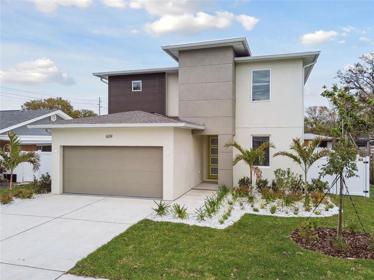 Front exterior of a new home in , Tampa, FL, highlighting curb appeal (Image 2).