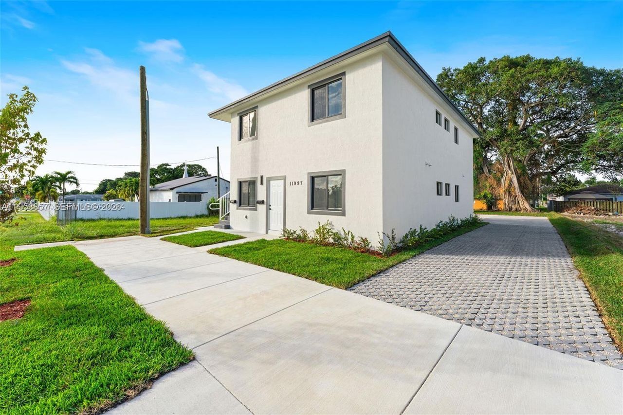 Exterior details and patio area of a home in , Miami (Image 2).